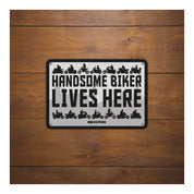 Oxford Garage Metal Sign: Handsome Biker Lives Here